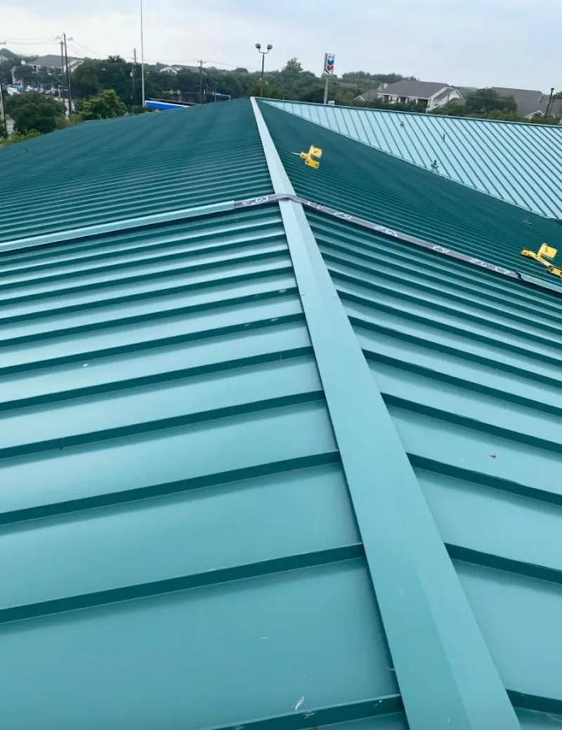 Green commercial metal roof ridge and valley for Metal Roof Repair in Schofield Barracks