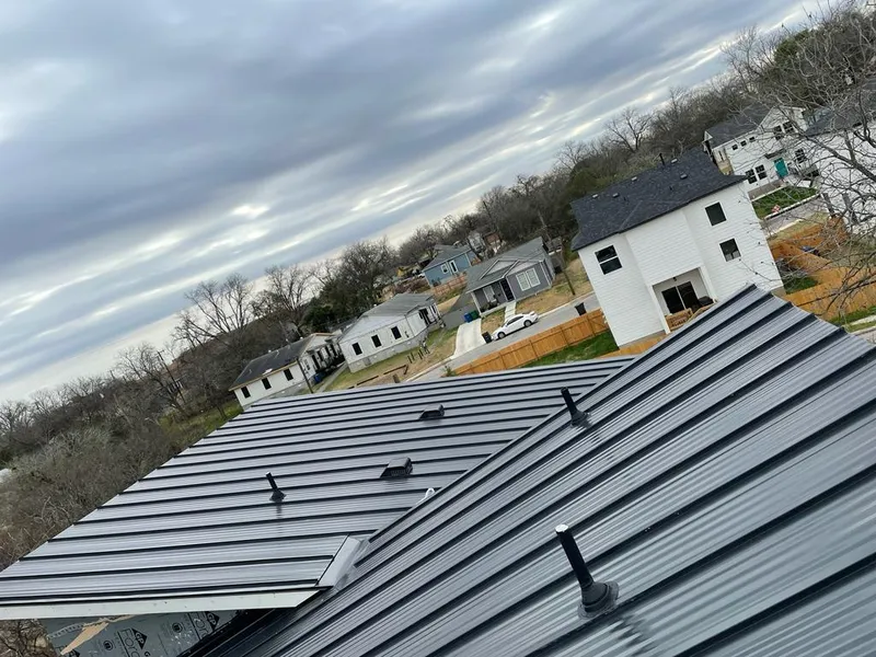 Standing seam metal roof panels with vents for Skylight Repair in Schofield Barracks